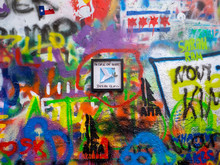 John Lennon Tribute Wall With Colorful Graffiti In Prague, Czech Republic
