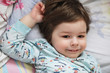 © alexkich - Portrait of a young child lying on a pillow