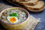 Fototapeta Tulipany - Żurek - polish easter soup with eggs and white sausage