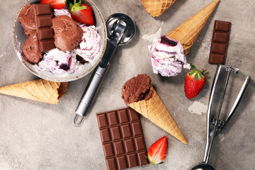 Wall Mural - Chocolate coffee ice cream ball in a bowl and strawberry and vanilla