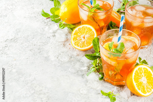 Plakaty do baru - pubu cold-summer-drink-iced-tea-with-lemon-and-mint-on-grey-stone-background-copy-space