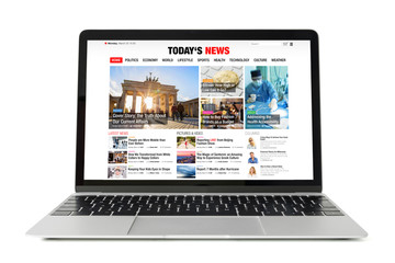 news website on laptop. all contents are made up.