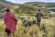 Traditional Masai and Ranger hiking in crater moutain