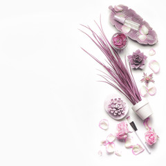 Wall Mural - pink purple cosmetic set for facial skin care with roses on white background, top view, place for te