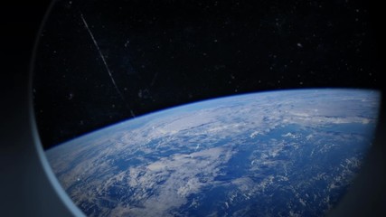 Wall Mural - earth is seen through scratched window of a spaceship. nasa earth footage has been used