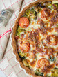 quiche with broccoli, cheese and tomatoes, on towel