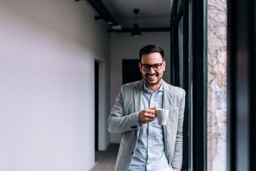 Portrait of a smiling businessman having a break.