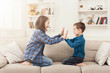 © Prostock-studio - Play clapping hands together, children game