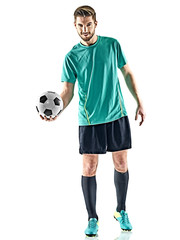 Wall Mural - one caucasian soccer player man standing holding football isolated on white background