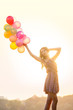 © Svetlana - Woman with colorful balloons