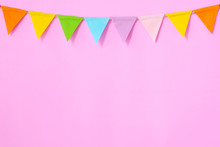 Colorful Party Flags Hanging On Pink Background, Birthday, Anniversary, Celebrate Event, Festival Greeting Card Background