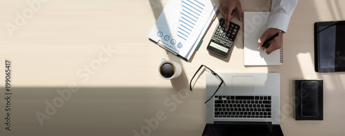 Cuadros en Lienzo Close up businessman using calculator on documents Unrecognizable finance use c