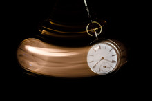 Swinging Pocket Watch Beckoning You To Look More Closely