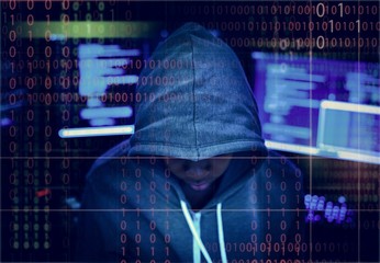 Wall Mural - hacker in a hoody with tech background