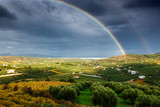 Fototapeta Tęcza - Double Rainbow and cultivated land, Greece