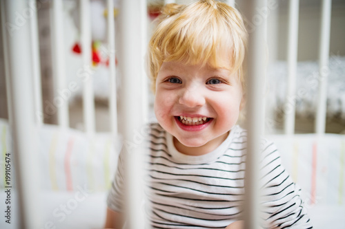 Cute Toddler Boy In The Bedroom Close Up Kaufen Sie