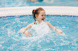 © Photocreo Bednarek - Little child enjoying her time in a hot tub.