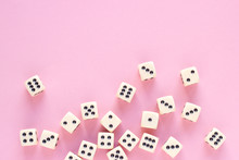 Gaming Dice With Copy Space On Pink Background. Concept For Games, Game Board, Presentation, Banners Or Web. Top View. Close-up.