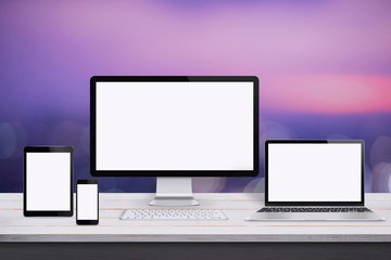 Leinwandbilder - Responsive web design mockup. Devices with isolated screen on white wooden desk. Purple background.