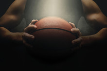 Basketball Player With Ball Over Dark Background