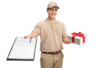 Canvas Print - Delivery guy holding a clipboard and a present