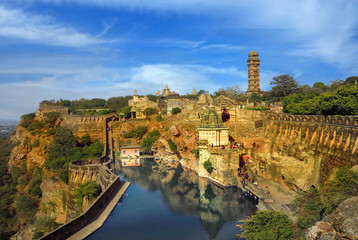   a stone fortress on the hill of fort chittorgarh in india       