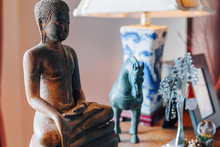 Iron Bronze Buddha And Hors Statue In Living Room Interior Decor Element