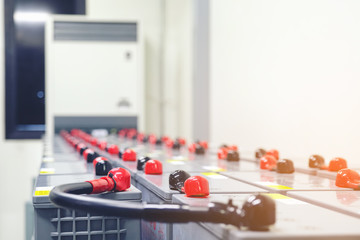 Battery pack in battery room in power plant for supply electricity in plant during shutdown phase, Rows of batteries in industrial backup power system.