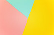 © Юлия Завалишина - Blue, yellow and pink pastel color paper geometric flat lay background