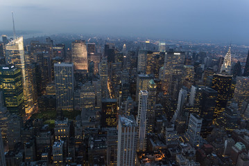  City night lights/Manhattan seen from above late evening as a display of shapes and lights.
