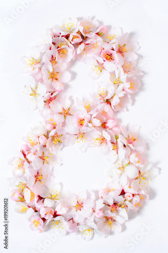 Fotografía Arabic numeral eight lined with flowers on a white background