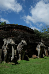 Wall Mural - Stone Elephant Statues Base of Stupa at 