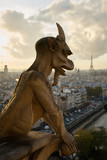 Fototapeta Paryż - Chimera of Notre Dame, with Eiffel Tower in the background, Paris, France