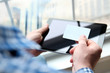 © Saklakova - business man entering data of a credit card . On-line shopping on the internet using a digital tablet