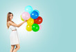© fotofabrika - Portrait of joyful woman with balloons