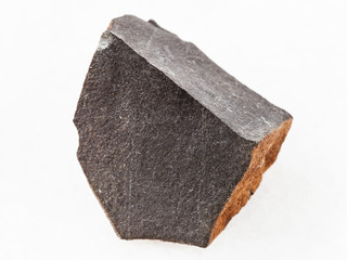 raw hyalobasalt (tachylite) stone on white