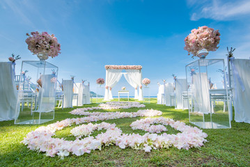 Wall Mural - Romantic wedding ceremony on the lawn Sea view.