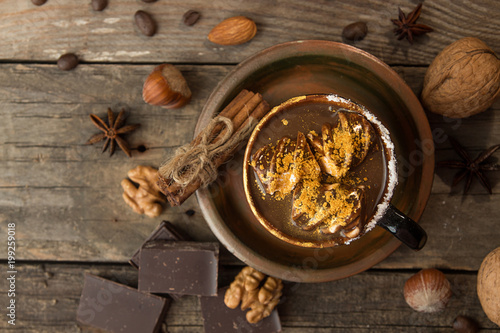 Fototapeta na drzwi i meble Cup of hot chocolate. Mug of traditional winter chocolate drink. Rustic vintage style.
