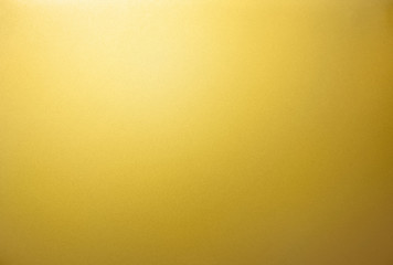 Gold texture. The smooth surface texture of the gold metal sheet