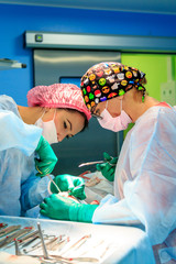 Poster - Surgeons operating a patient in operating room