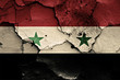 flag of Syria painted on cracked wall