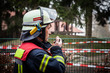 HDR - Feuerwehrmann im Einsatz mit Funkgerät - Serie Feuerwehr 