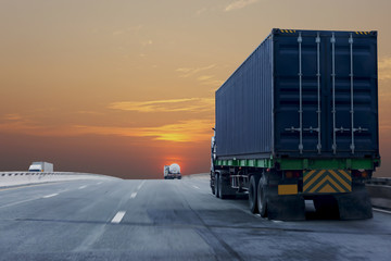 Truck on highway road with container, transportation concept.,import,export logistic industrial Transporting Land transport on the asphalt expressway with sunrise sky