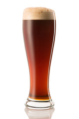 Wall Mural - dark beer in a glass, isolated on a white background