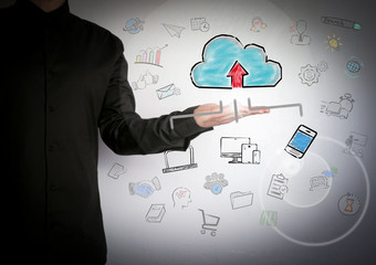 Wall Mural - cloud technology concep. successful businessman at the light background.