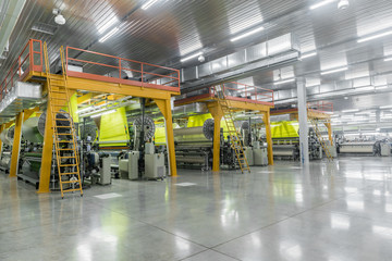 Wall Mural - Machine and equipment in the weaving shop, a general overview. interior of industrial textile factory