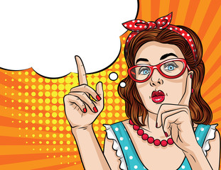 Wall Mural - Vector retro illustration pop art comic style of a pretty woman in eyeglasses  pointing finger up. Vintage poster of a girl showing something.