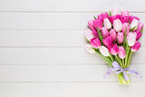 Fototapeta Tulipany - Pink tulip on the white background. Easter background