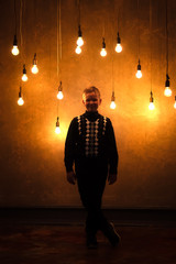 Wall Mural - Boy is with light bulbs