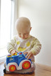 © Elena Stepanova - baby boy playing car